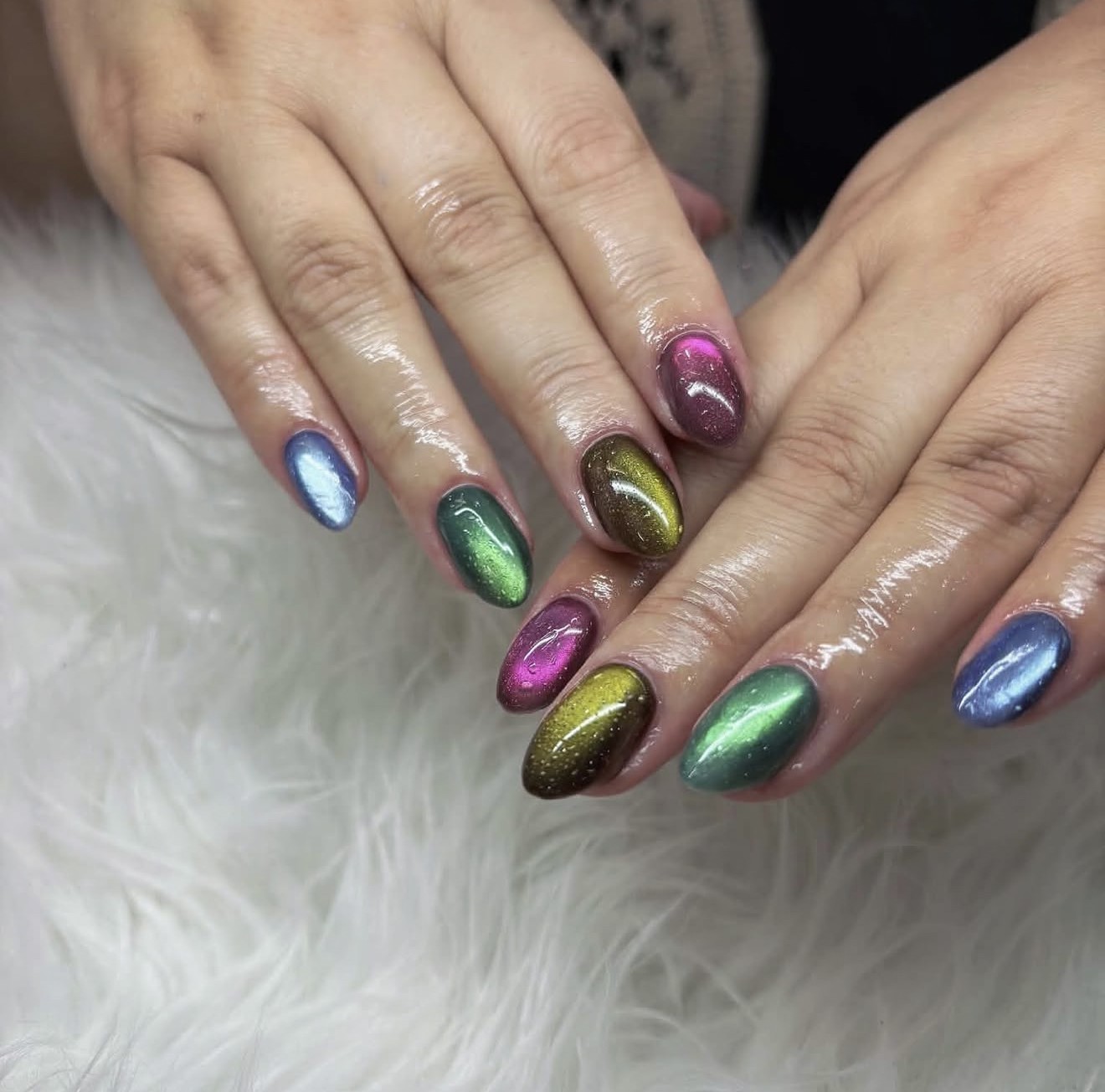 Multicolour cat eye nails in blue, green, olive green and pink